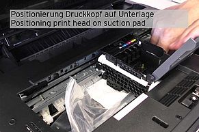 positioning print head on suction pad