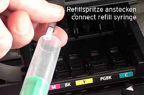 Connect refill syringe to plastic hose