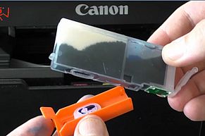 Remove orange cap from ink port