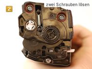 Samsung CLP-415, CLX-4195 - zwei Schrauben lösen Samsung CLT-K 504 S/ELS - zwei Schrauben lösen