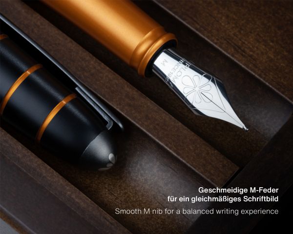 Set di penne stilografiche Diplomat Elox Ring nero-arancio con inchiostro da scrittura e astuccio in legno di wengé